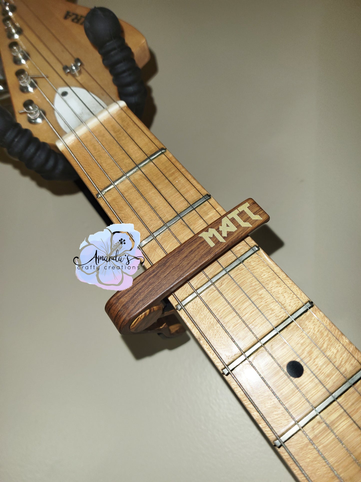 Customizable rosewood guitar capo