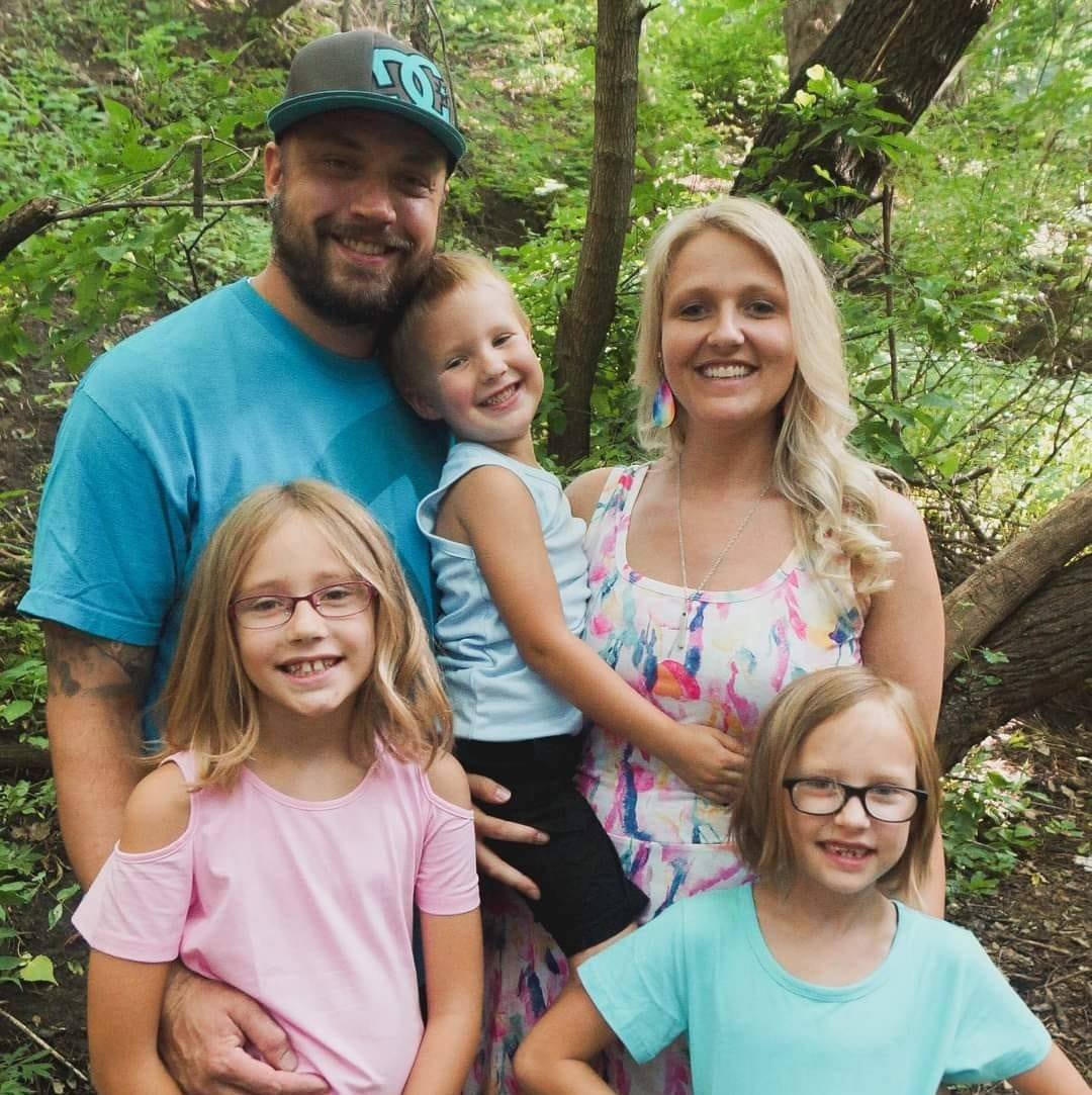 Amanda, the founder and CEO of Amanda's Crafty Creations and her family