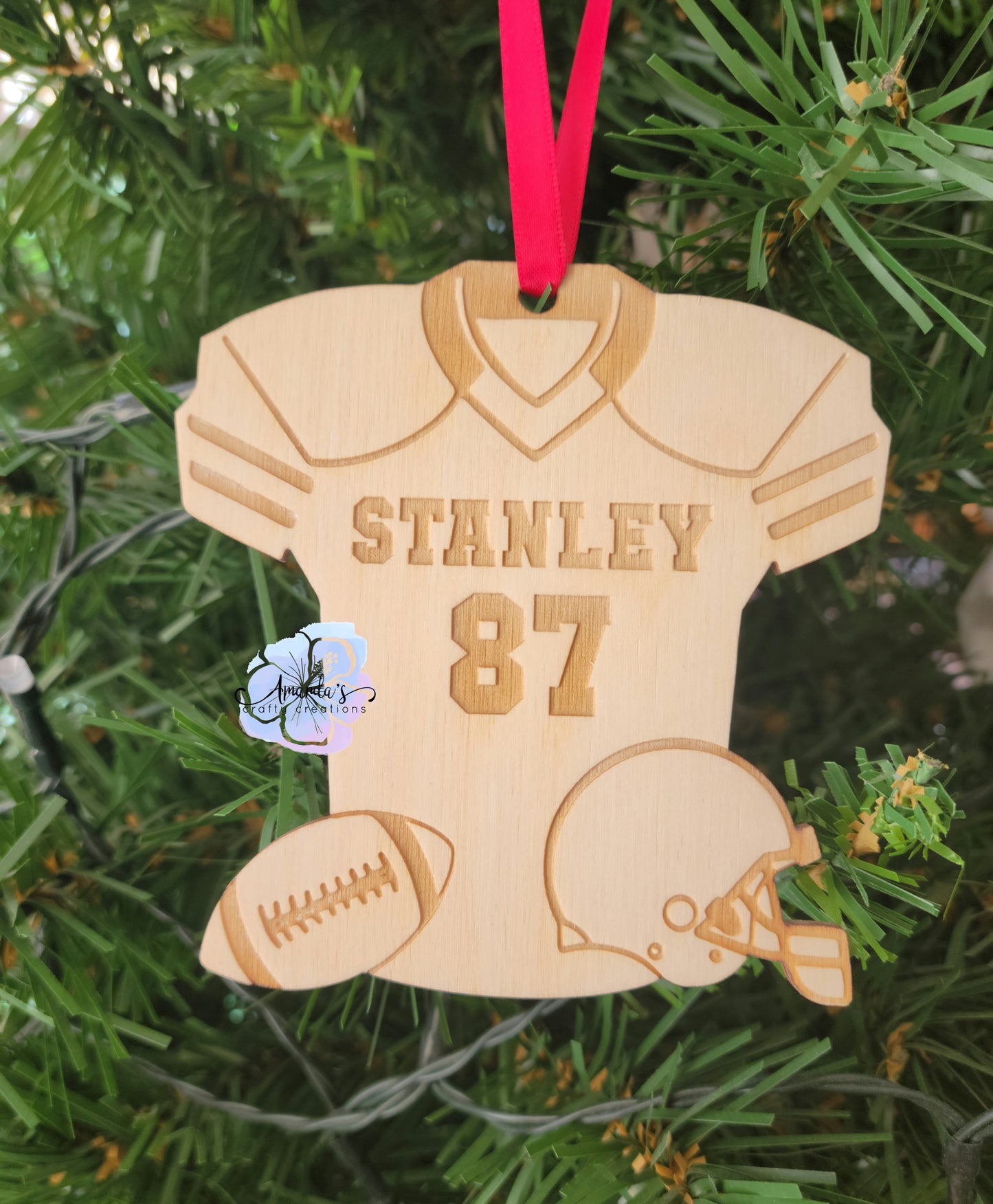 Customizable football shaped jersey with number and name Christmas tree ornament
