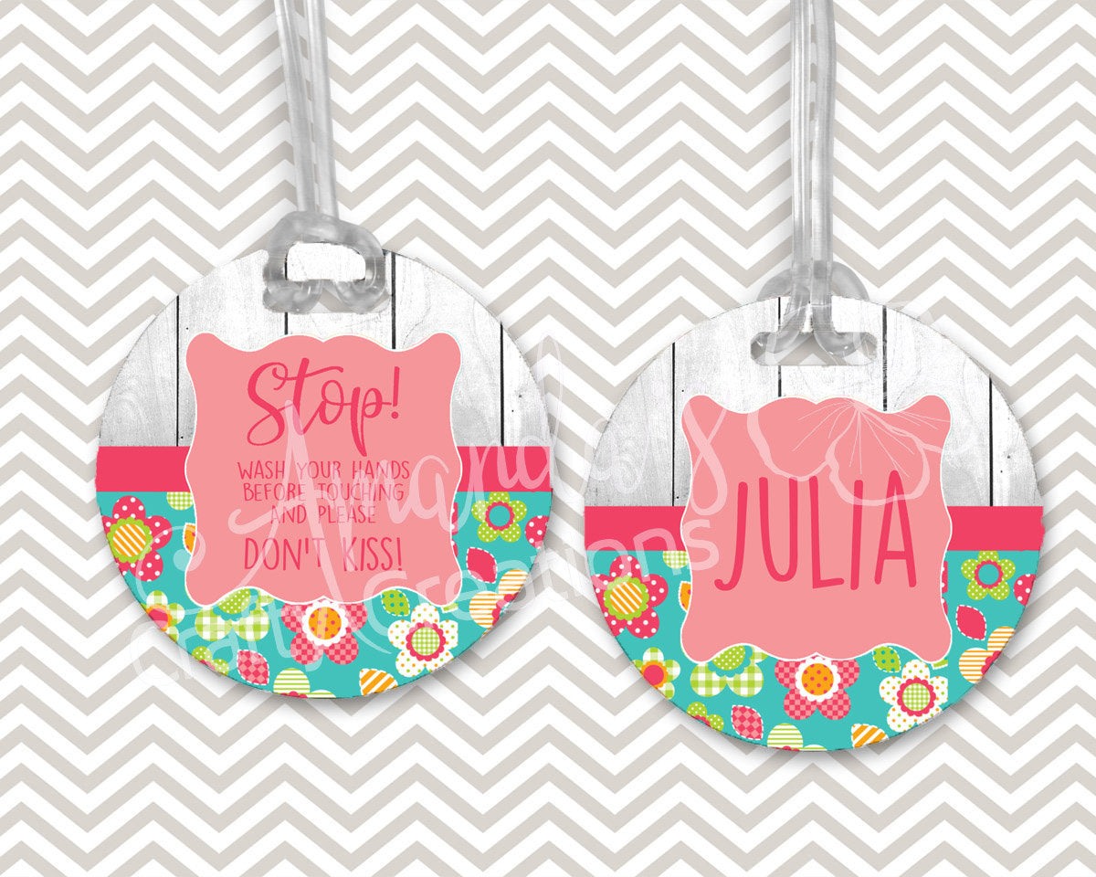 Stop wash your hands before touching and don't kiss the baby stroller tags, pink and teal